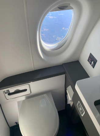 Airplane toilet with window
