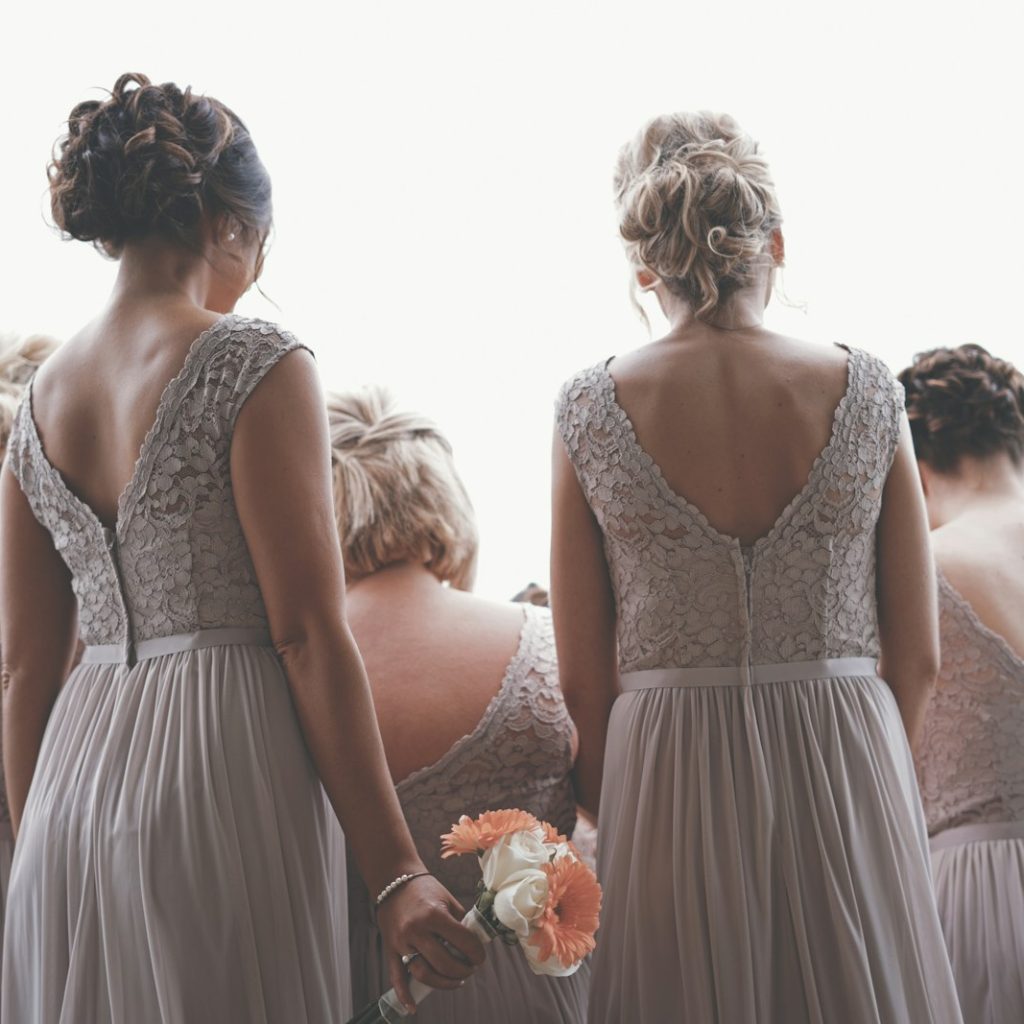bridesmaids wearing gray gowns
