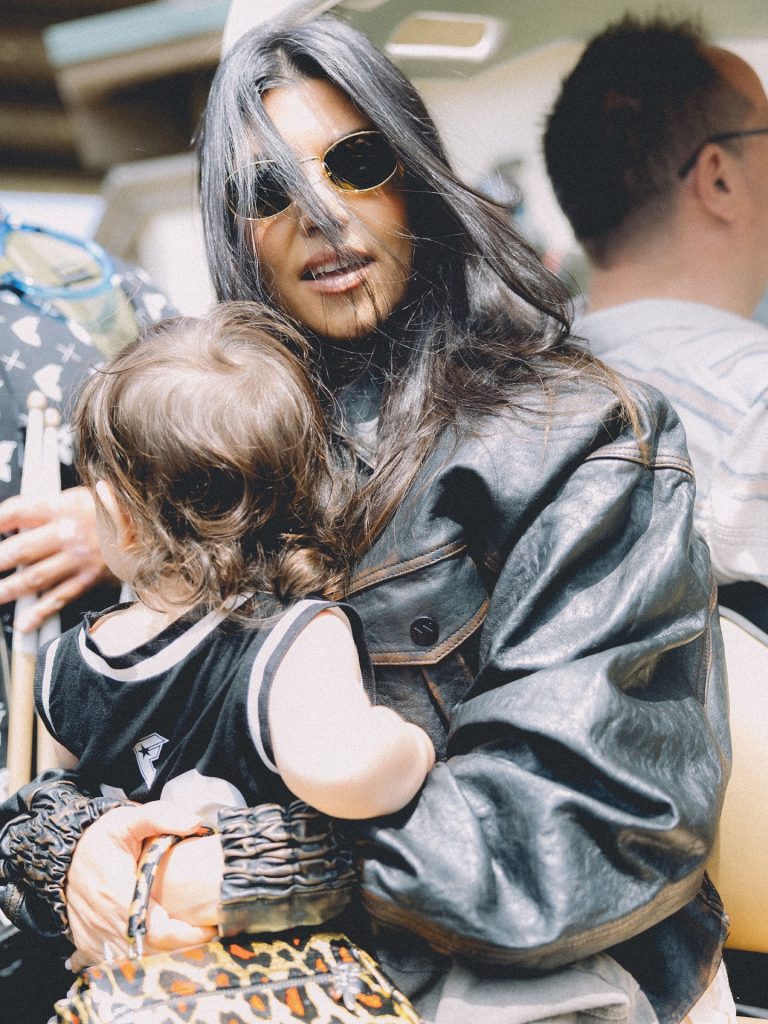 Kourtney Kardashian with her child