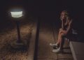 Woman sitting on the floor