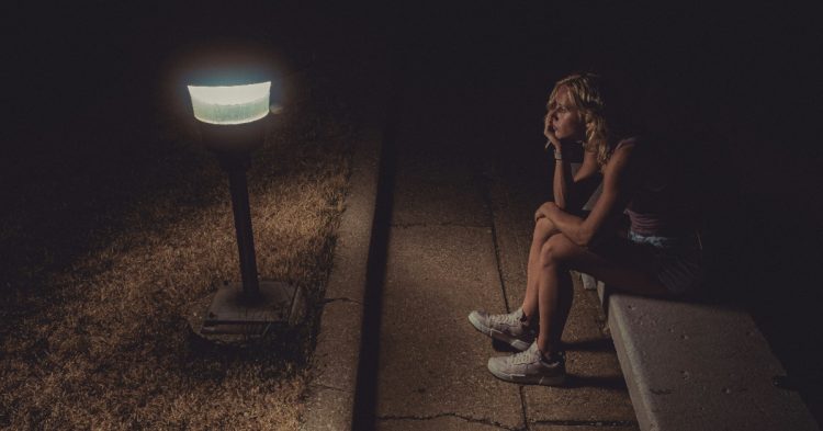 Woman sitting on the floor